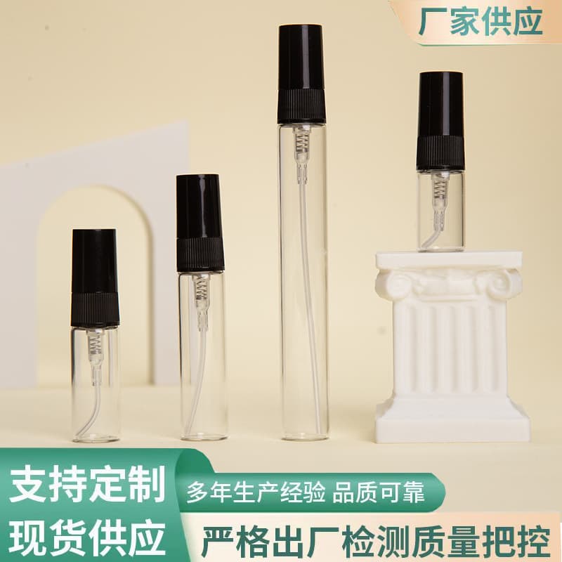 Miniature perfume decanters (2, 3, 5, 10ml), travel-sized, black plastic caps.