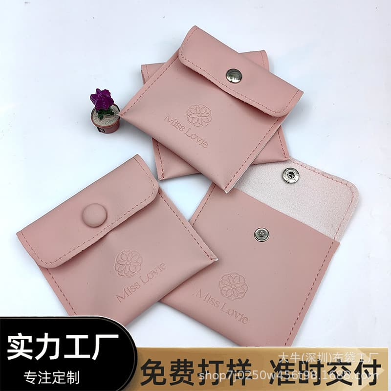Customized PU snap-on pocket packaging bags for bracelets, rings, necklaces, and other jewelry; free sampling.
