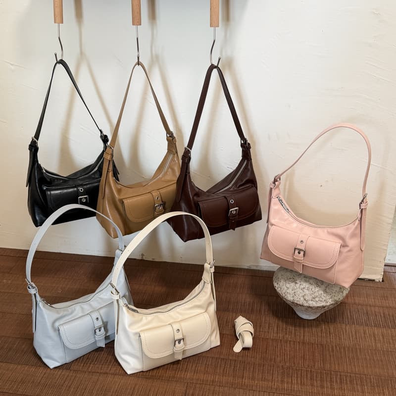 Wholesale Korean version light luxury portable small square bag women's bag 2026 summer new solid color stitching shoulder bag commuter armpit bag