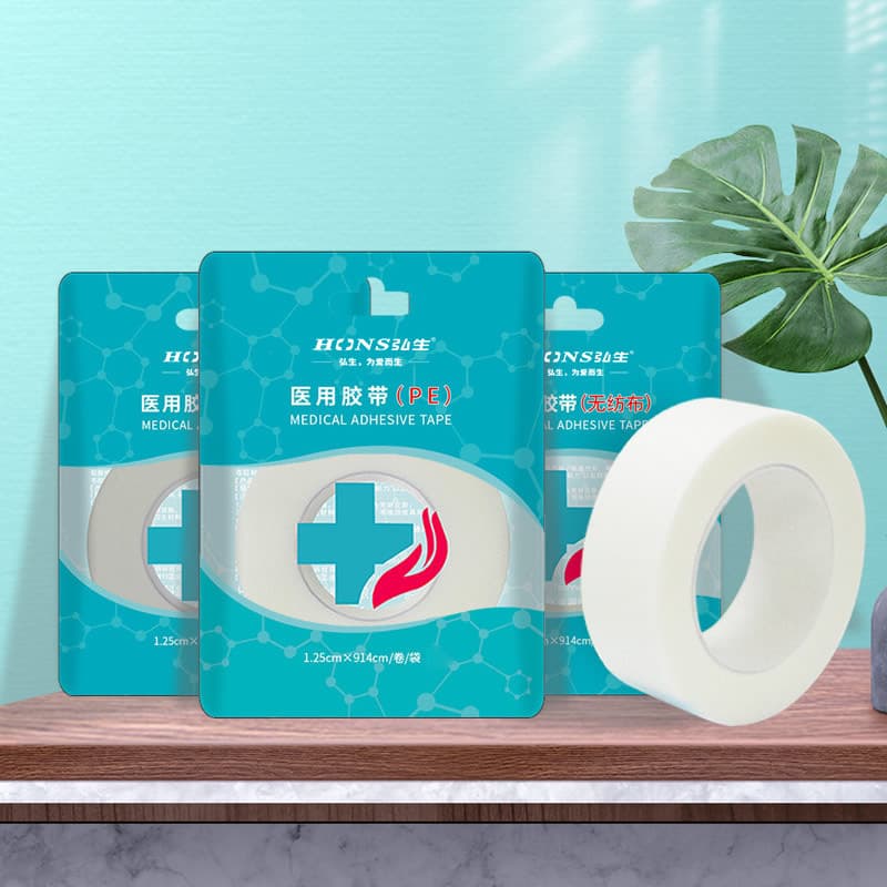 Hongsung Medical Tape Nonwoven Paper Tape PE Perforated Breathable Cotton Cloth Adhesive Cracked Rubber Plaster 1 Roll/Bag