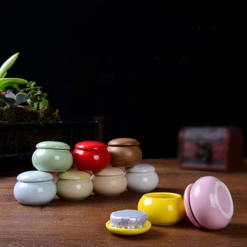 Mini ceramic tea containers, fragrance cream and powder jars, antique lipstick and rouge boxes, sealed porcelain pots for prosperity plants.