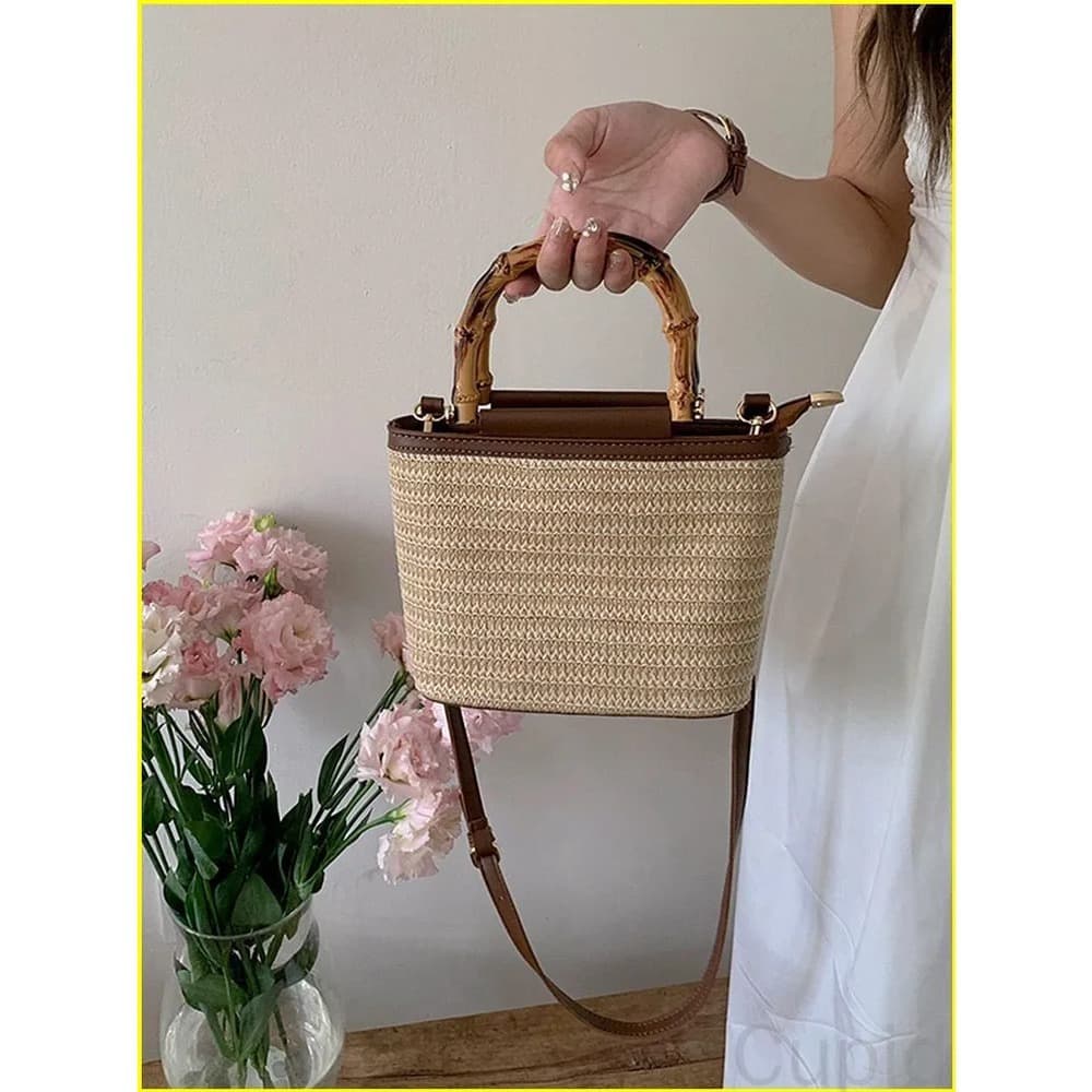 High-end textured small bag for women summer 2025 new niche crossbody bag woven women's portable straw bucket bag