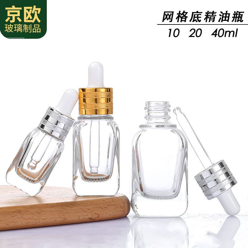 Manufacturer wholesale transparent square thickened essential oil bottle cosmetics dispensing bottle dropper essence bottle glass empty bottle