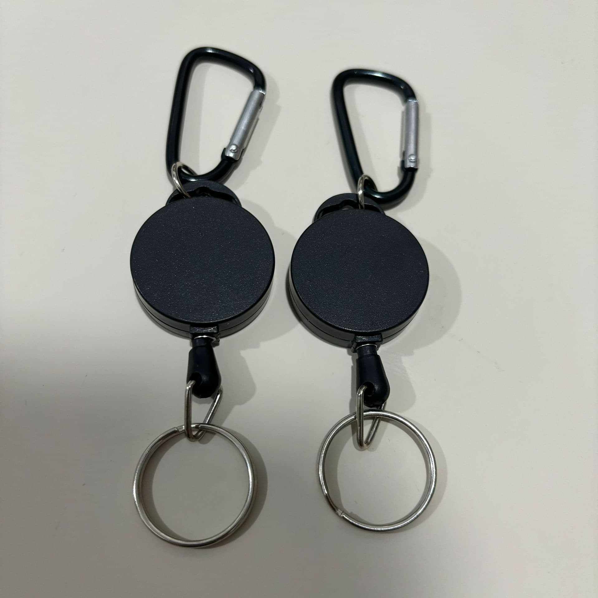 Cross-border hot sale outdoor pull-tab buckle matte double-sided retractable buckle backpack key ring buckle ski hiking buckle line puller