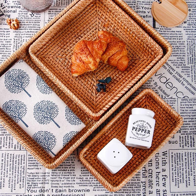 Vietnamese retro handwoven rattan fruit bowl, bread basket, restaurant breakfast snack tray in Japanese minimalist style.