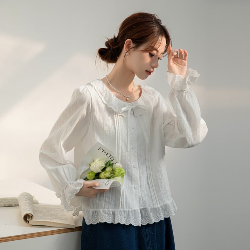 Literary white shirt for women 2025 spring new French style gentle and slim long-sleeved lotus leaf collar lace-up doll shirt