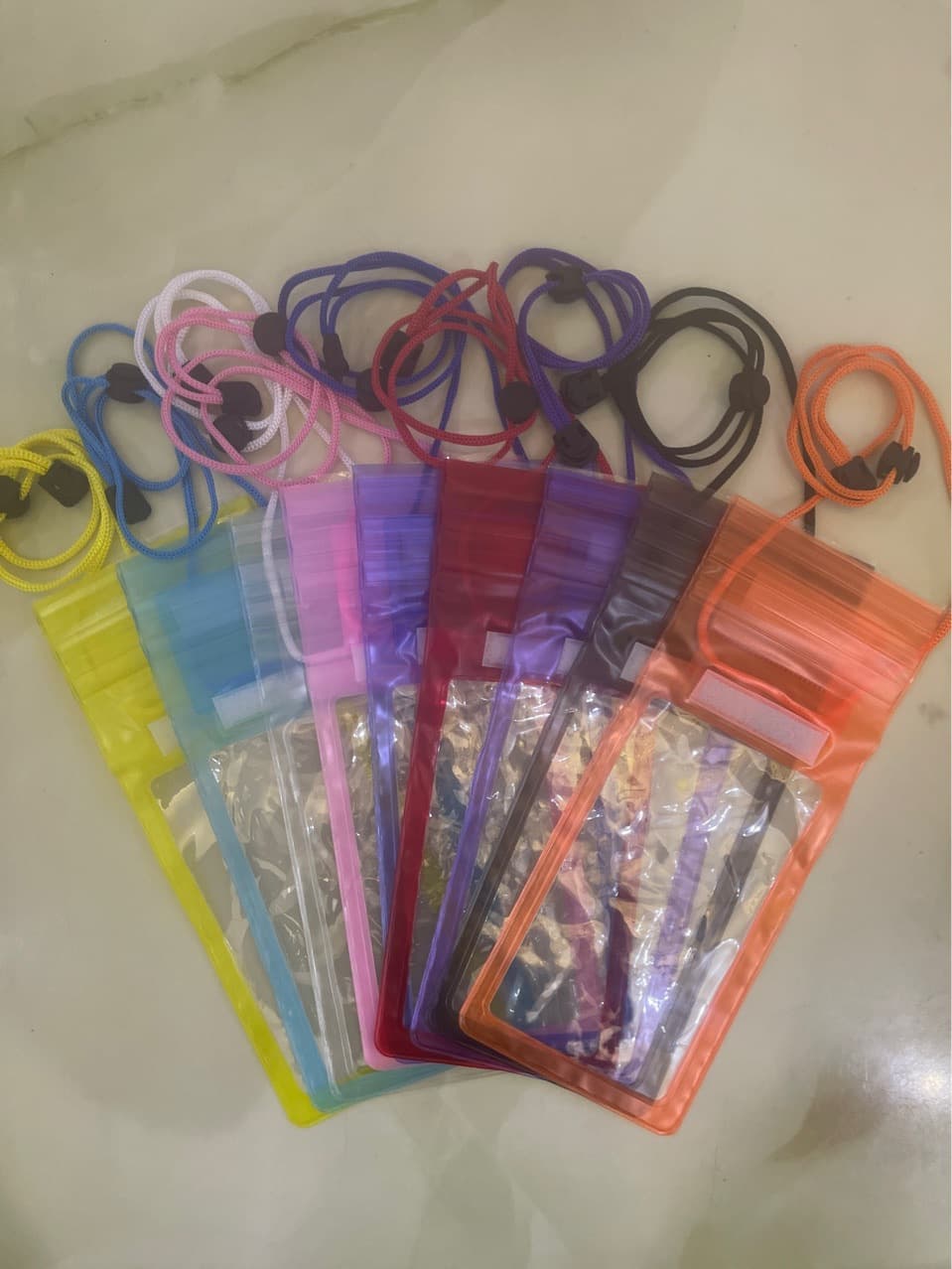 Velcro waterproof phone bag in ten colors.