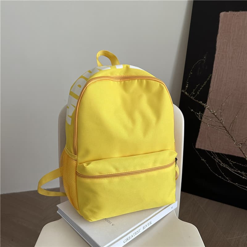 Japanese nylon solid color letter school bag simple lightweight waterproof wear-resistant backpack class commuting large capacity backpack