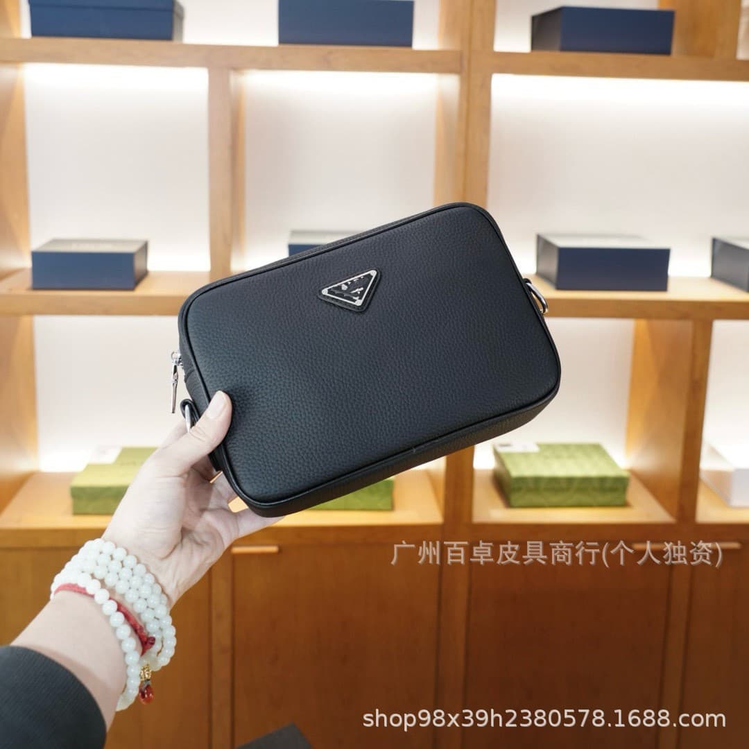 Pjia first-layer cowhide triangle logo crossbody bag genuine leather camera bag versatile fashionable men's bag