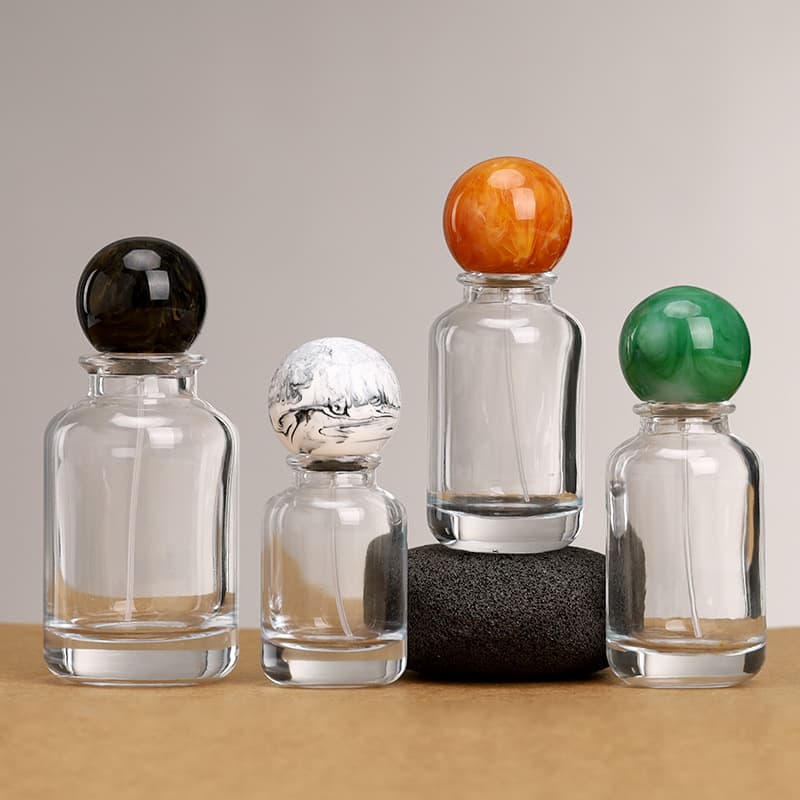 In stock: 30ml, 50ml, and 100ml cylindrical thick-bottomed press-type spray bottle with snap-on design.