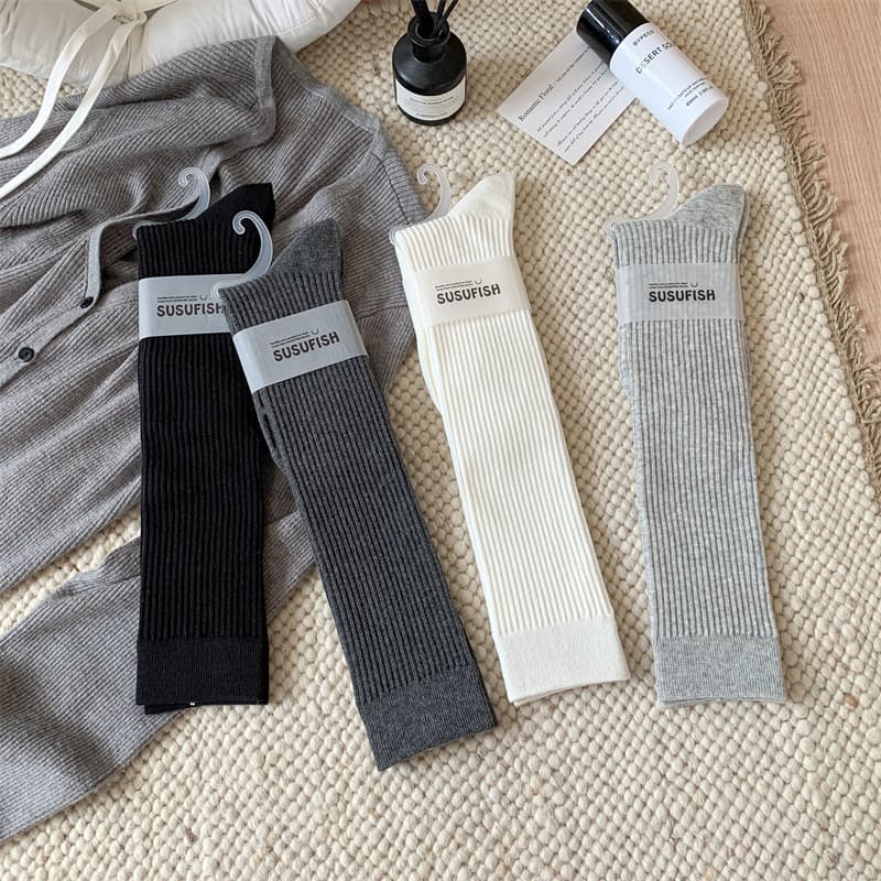 Autumn winter new calf socks for women solid color versatile slight pressure slimming long socks simple Korean version ballet style slouch socks.