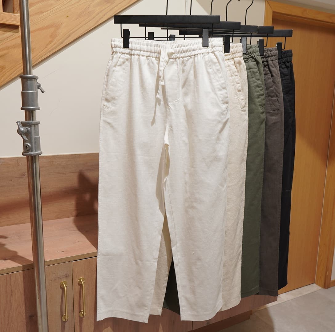 Affordable European and American fashion men's wholesale elastic waist linen black trousers, dark brown casual pants, white pants
