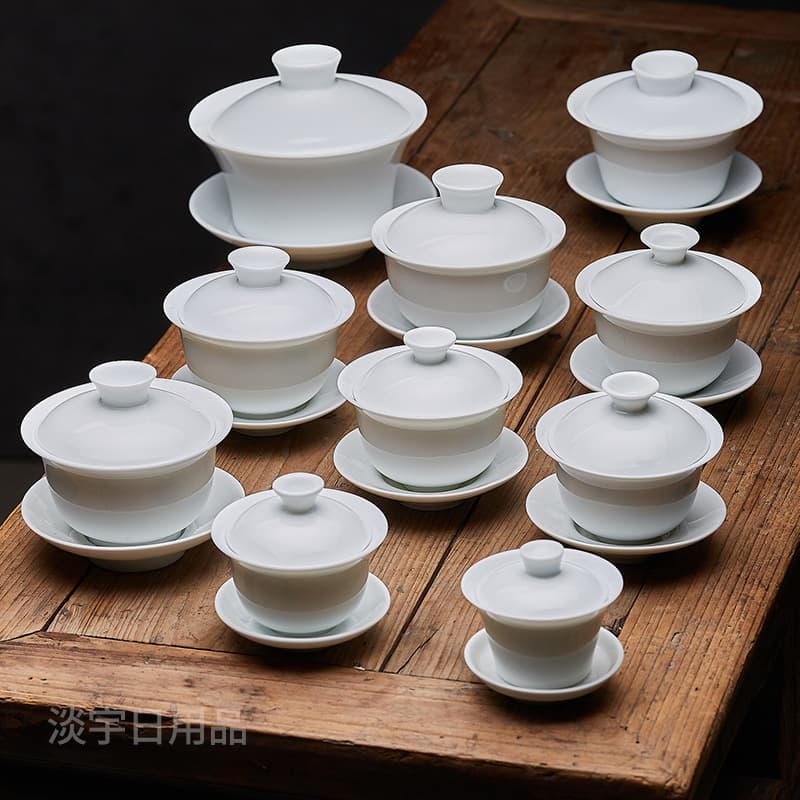 Wholesale white porcelain three-piece gaiwan, two-piece Kung Fu tea set, large, medium and small pure white household tea bowls and ceramic teacups.