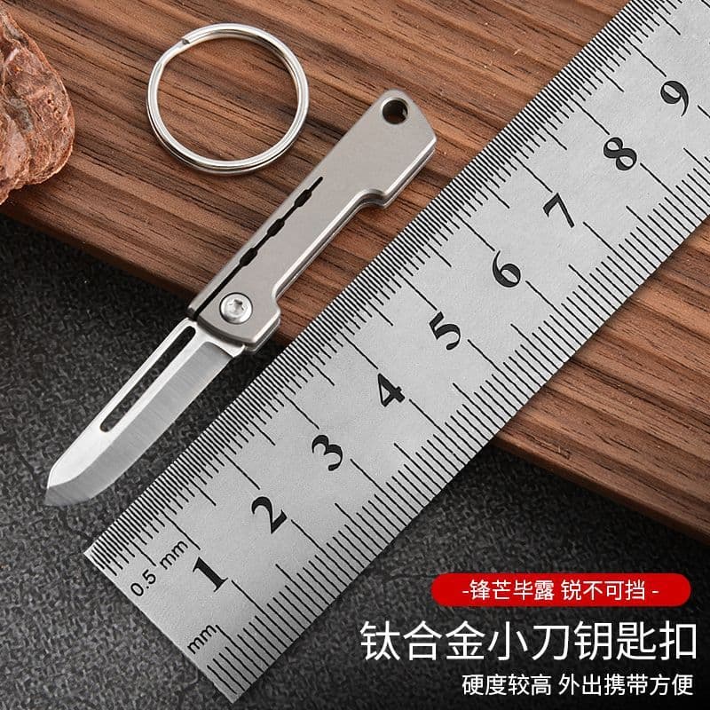 Portable Titanium Alloy Folding Knife Mini Pocket Knife EDC Keychain Camping Knife Pendant Box Cutter