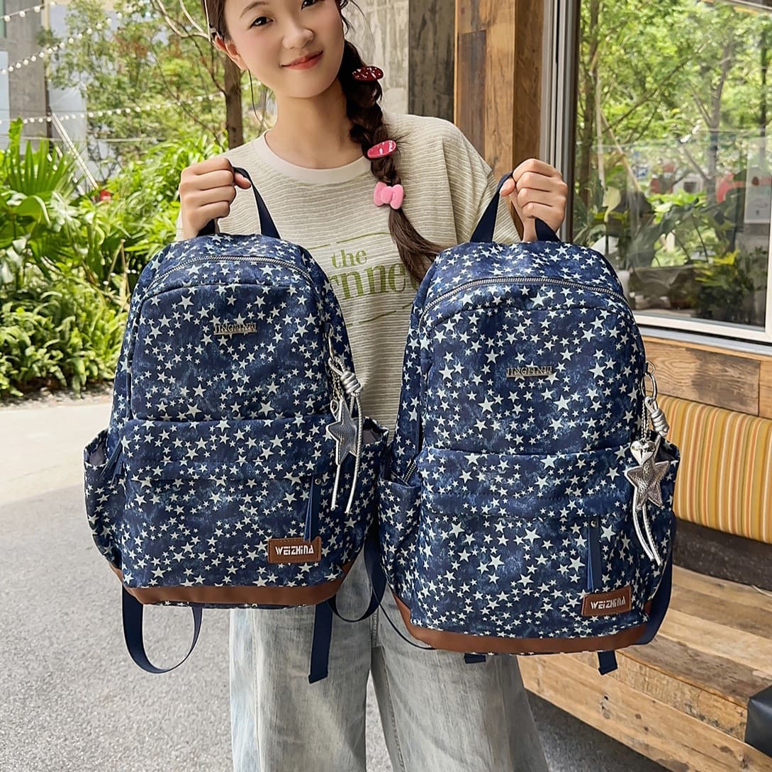 Cross-border new schoolbags for junior and senior high school girls, large-capacity star prints, high-looking backpacks, primary school students’ computer bags