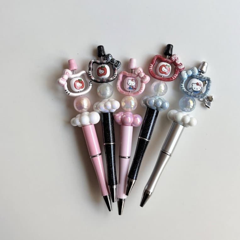 Instagram-style Sanrio and Hello Kitty DIY ballpoint pen, high-value rotating pen, Korean-style cute ballpoint pen.