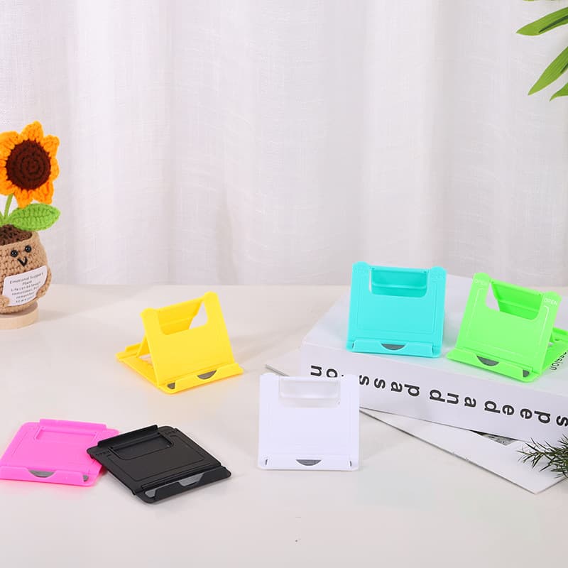Creative lazy desktop phone stand, simple foldable plastic phone stand, wholesale gift with customizable LOGO