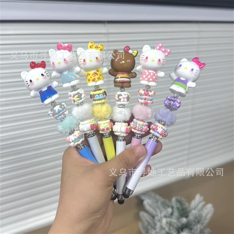 Japanese cartoon KT cute primary school girl ballpoint pen rotating bead pen DIY small gift Sanrio stationery