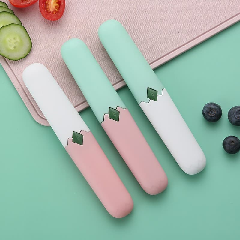 Portable 2-in-1 fruit knife with dual-head design for peeling and dicing, suitable for home/dormitory/office use