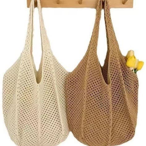 Summer popular new woven women's bag hand-held woven bag fashionable one-shoulder mesh bag seaside travel straw woven bag
