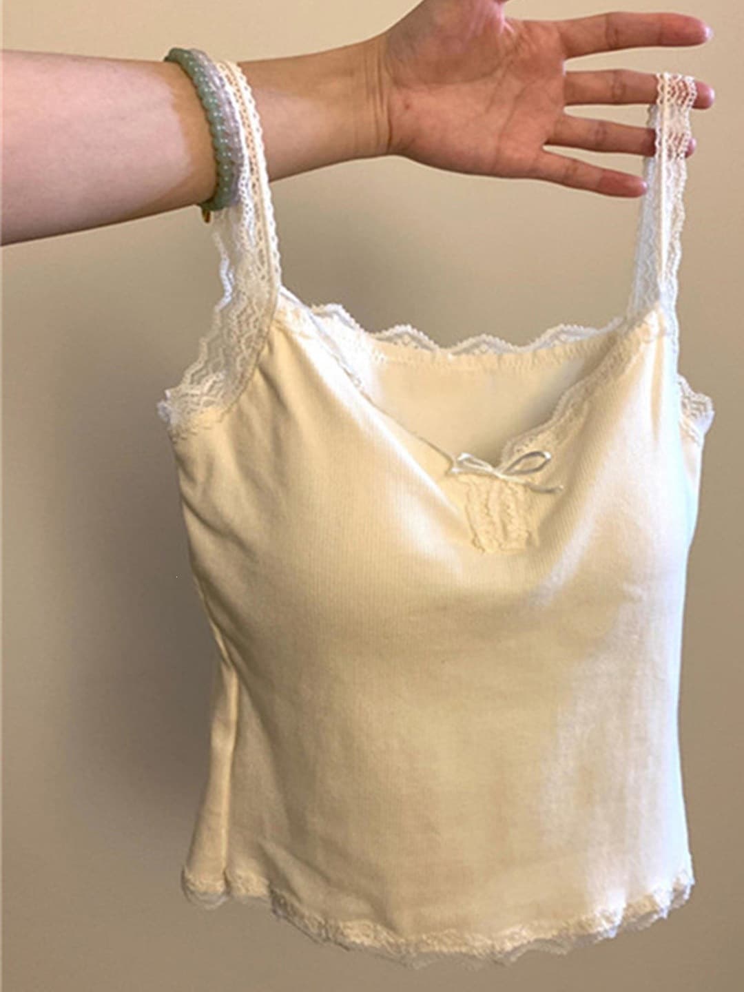 Stunningly beautiful pure lust lace camisole for women with breast pads for summer inner wear and outer wear with beautiful back and bottoming top