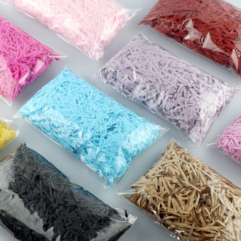 Factory wholesale raffia paper shreds, bulk quantities 10g, 20g, 50g, candy box filling shreds, in stock.