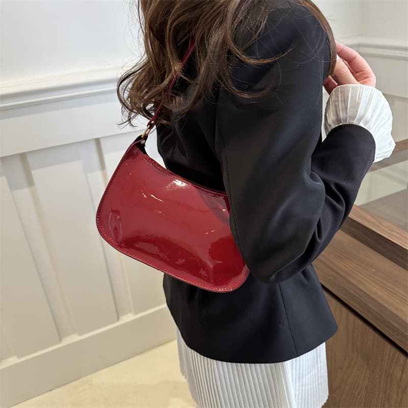 New Fashion Women's Small Bag 2024 Summer Retro Handbag Underarm Bag Patent Leather Solid Color Baguette Bag Stylish and Versatile