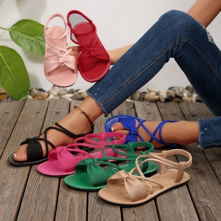 Cross-border large size 43 one-word hollow sandals with bow 2026 summer style cross-tied outer wear open-toe women's shoes