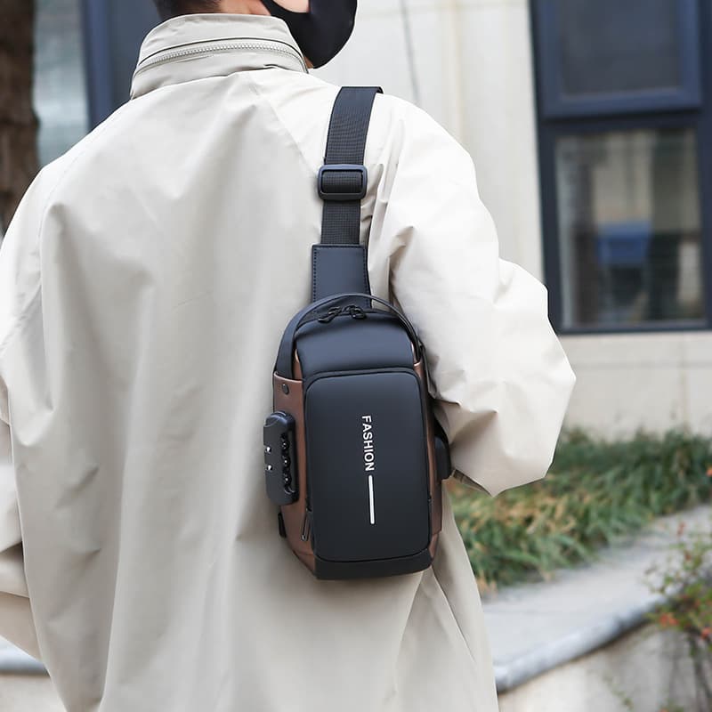 USB rechargeable trendy crossbody shoulder bag, casual sports anti-theft backpack, multi-functional combination lock chest bag.