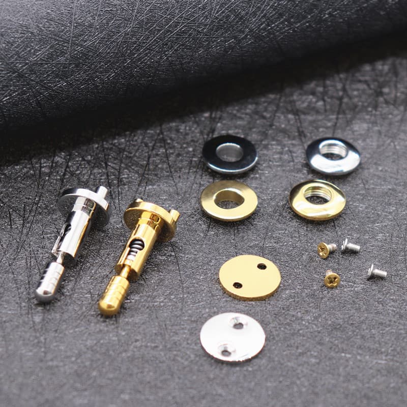 Stainless steel folding lock screws for handbags, luggage hardware, one-button locks, DIY handbag accessories factory.