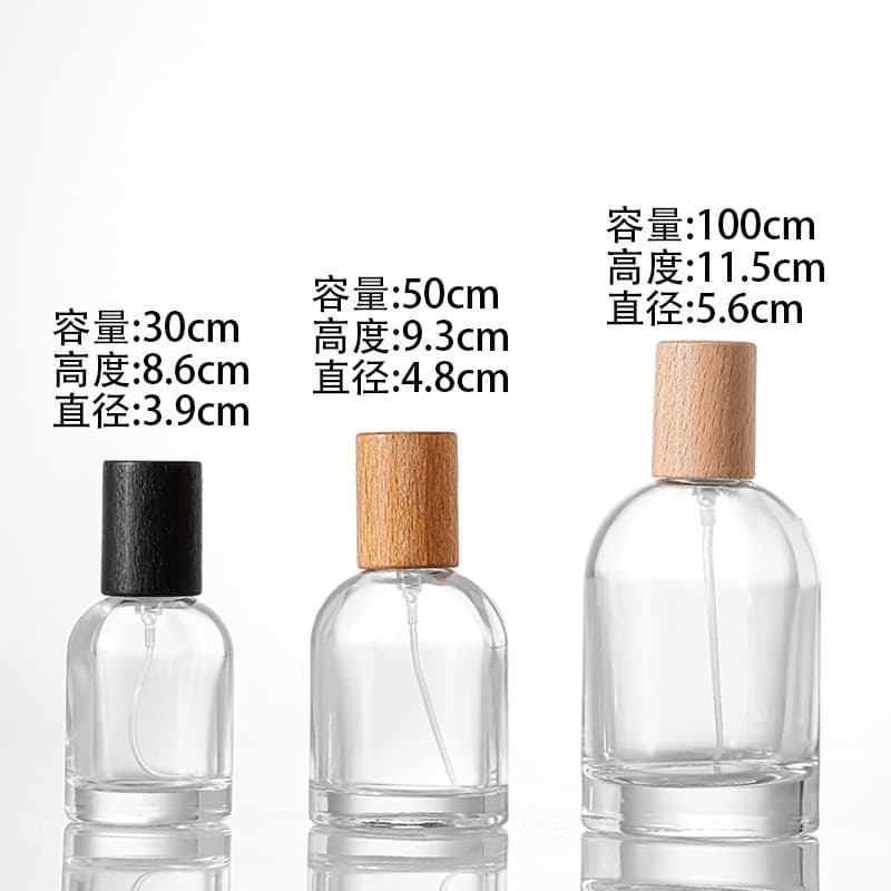 Cylindrical Glass Perfume Bottle Empty Premium Spray Snap-On Refillable Bottle with Beechwood Cap Export Round Shoulder Glass Bottle