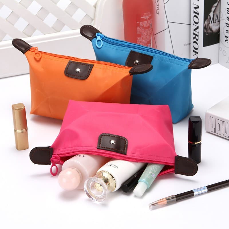 Travel-sized women's dumpling-shaped cosmetic bag, foldable waterproof storage bag for dumplings and cosmetics, gift storage bag, ready for wholesale.