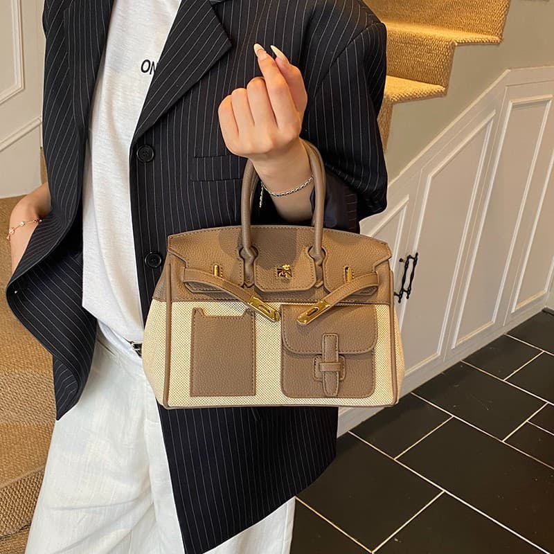 New Contrast Color Platinum Canvas with Leather Handbag Large Capacity Commuter Fashion Shoulder Crossbody Bag for Women