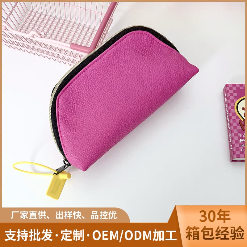 Portable travel cosmetic bag fashionable PU leather semi-circle hand toiletry bag Barbie pink lipstick bag factory wholesale