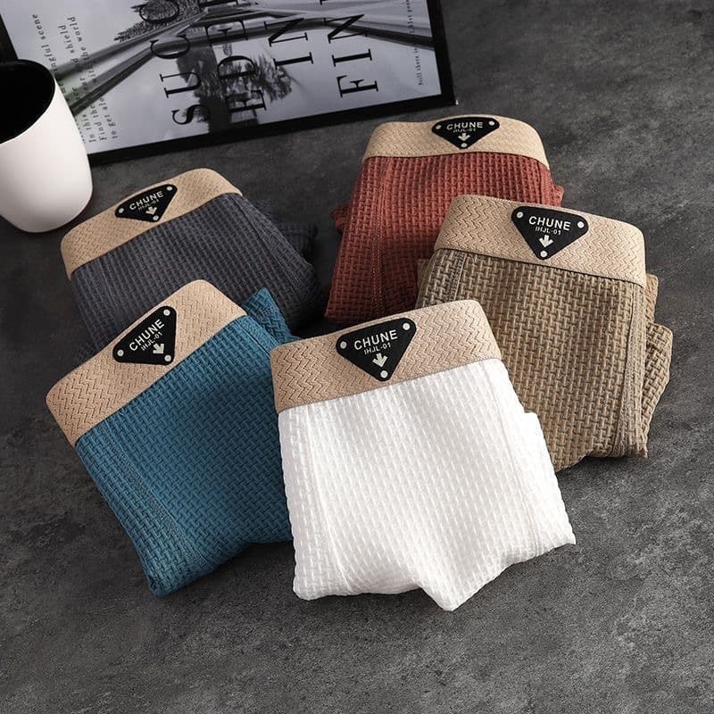 New Ice Silk Men's Boxer Briefs Spring/Summer Cool Breathable Flat Angle Pants Embossed Solid Color Mid-Waist Men's Boxer Shorts