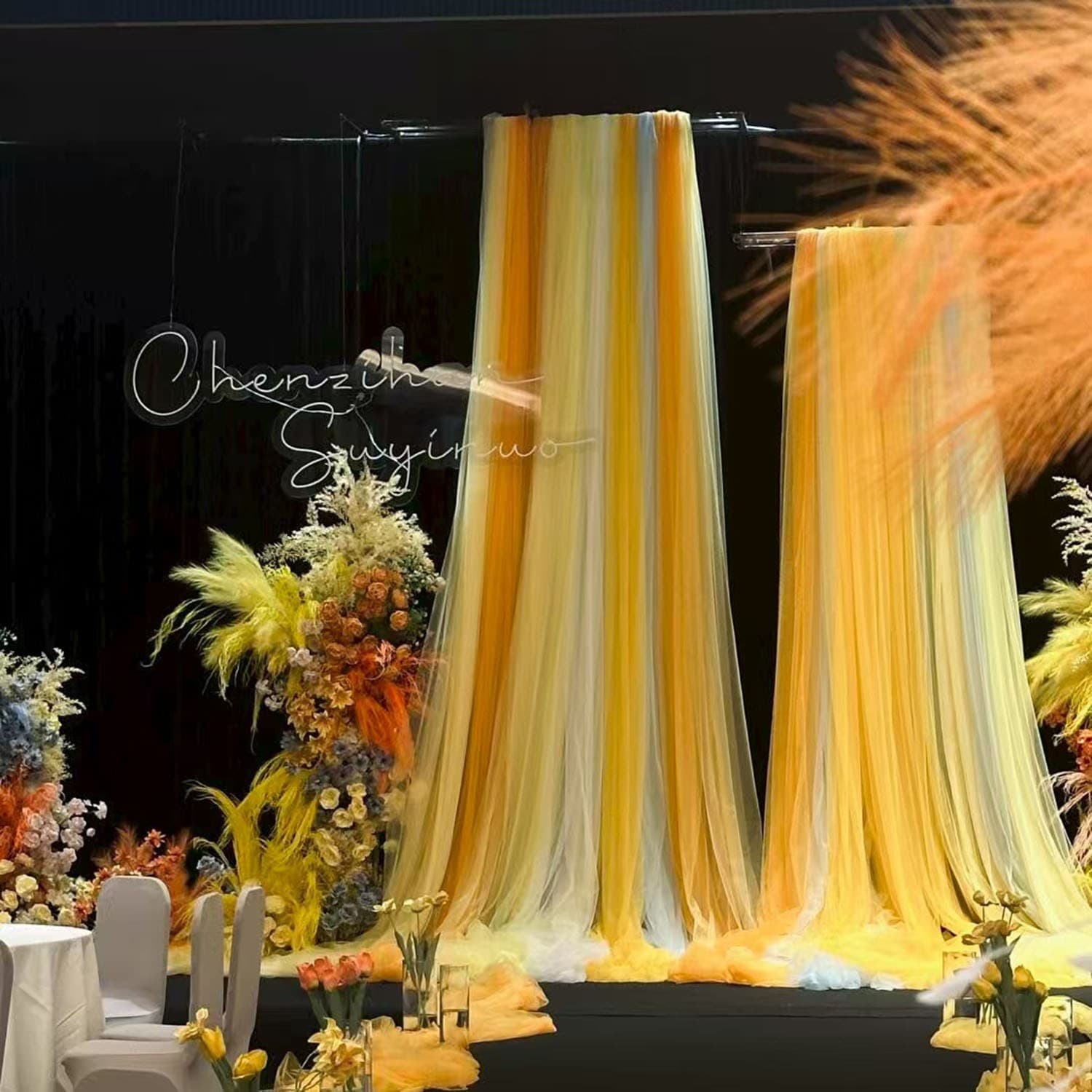 Yellow and light yellow wedding decorations, light and sheer soft gauze curtains, netting fabric, kindergarten-themed waterfall decorations.
