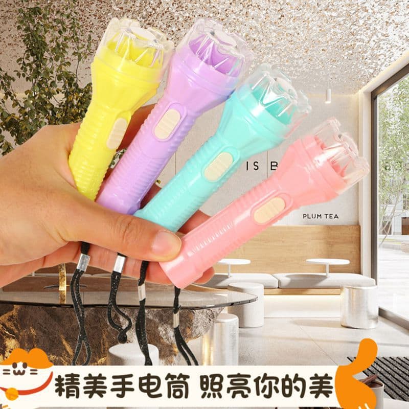 Large flashlight cultural and creative plastic mini small flashlight wholesale LED light-emitting small flashlight factory direct sales wholesale