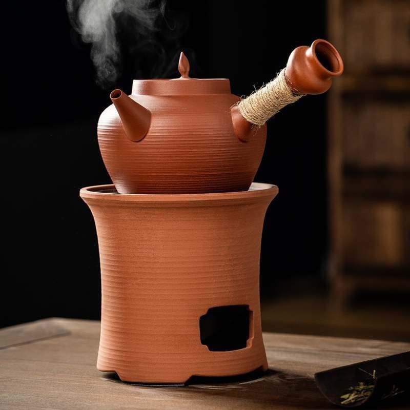 Chaozhou clay teapot for boiling water, side-handled red clay teapot, tea brewing vessel for home use, charcoal stove, electric ceramic stove for brewing tea.