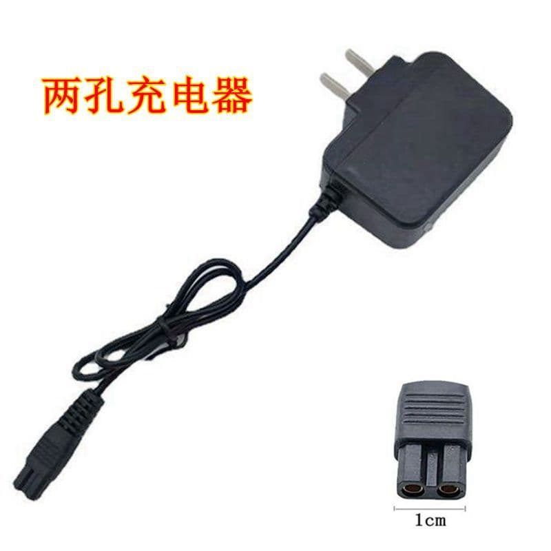 Universal two-hole charger for 4.2V lithium battery headlamps and flashlights.