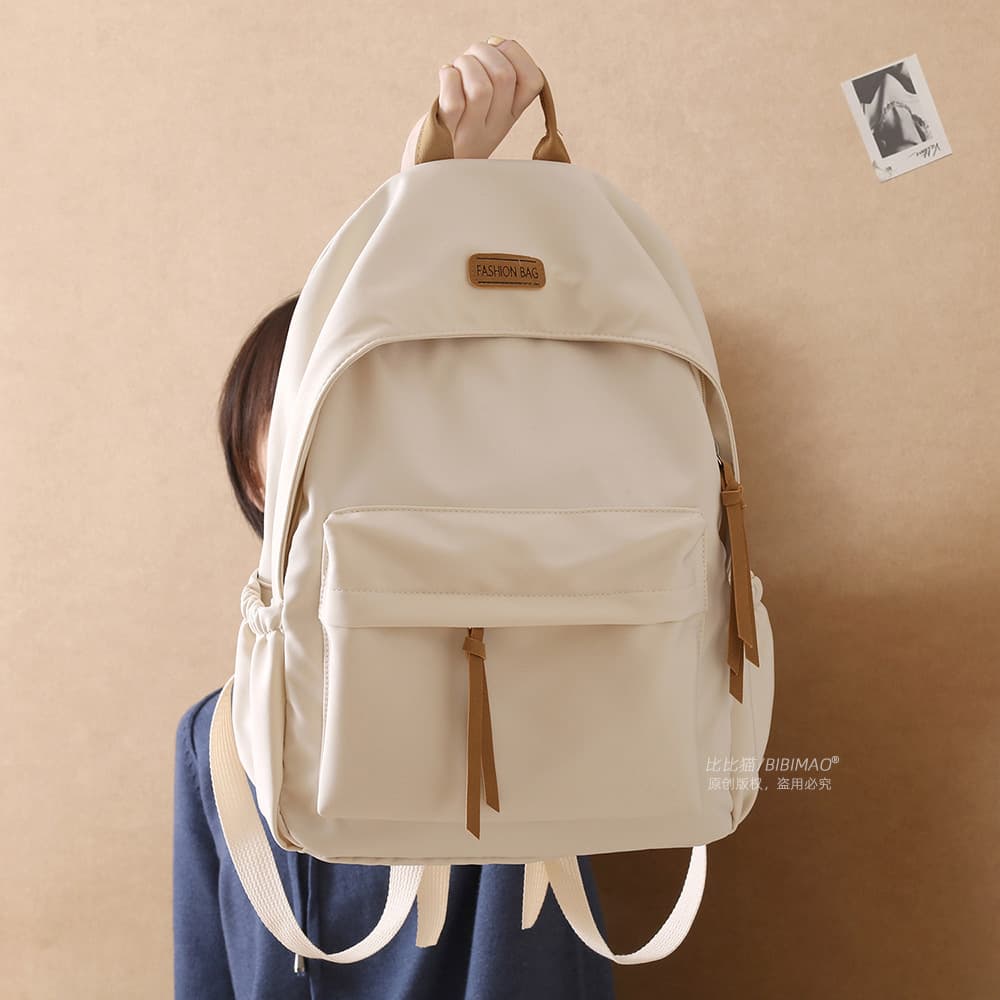 Korean-style waterproof versatile backpack for middle and high school girls, simple forest-style fashionable backpack