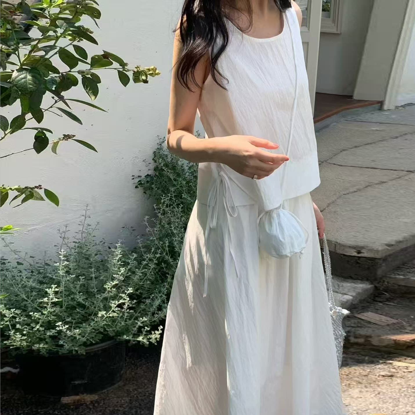 Korean style light purple square collar sleeveless suit for women, short vest, half length skirt, loose, gentle and casual two-piece set