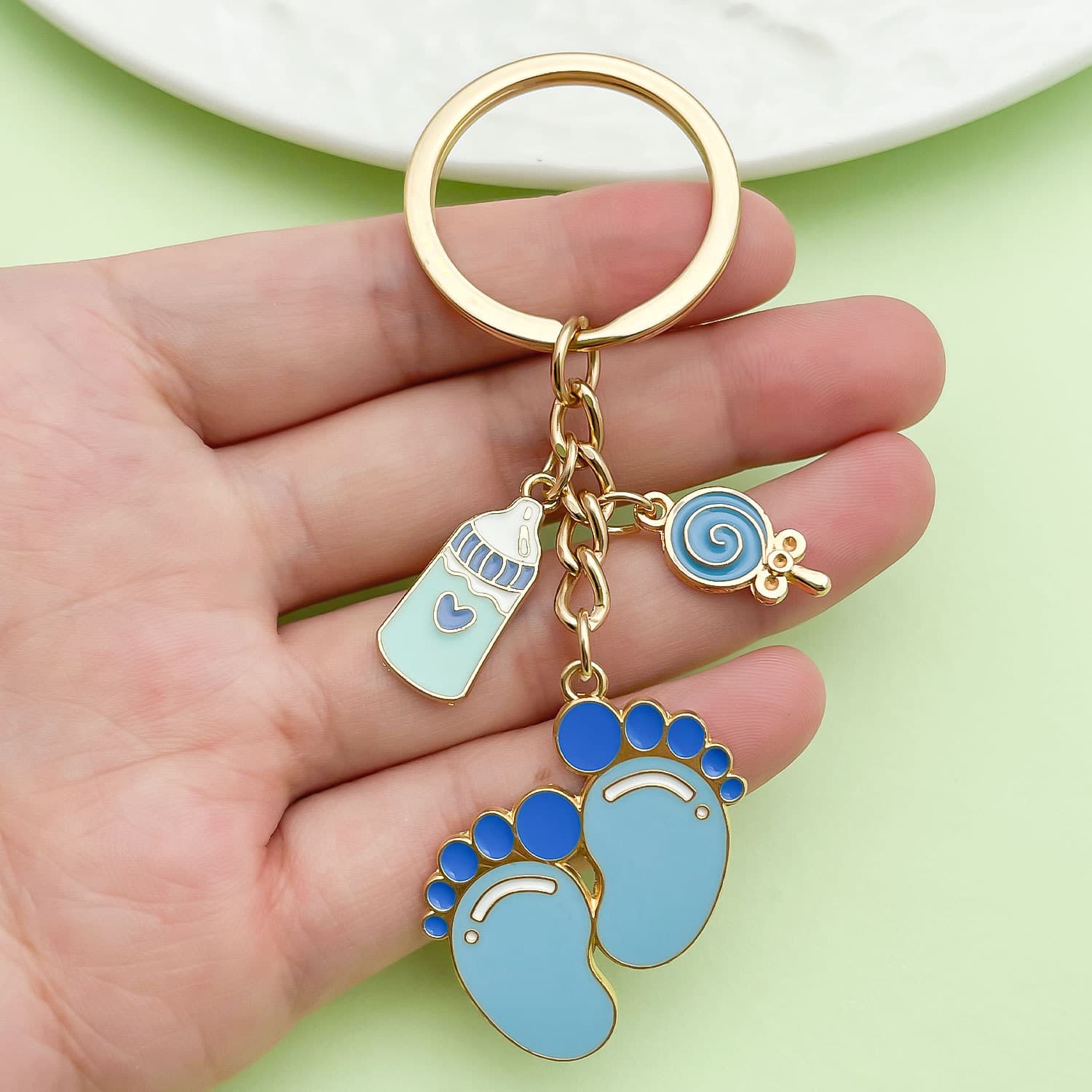 Amazon's popular cartoon oil dripping milk bottle clothes baby foot pendant children's free matching pendant key ring