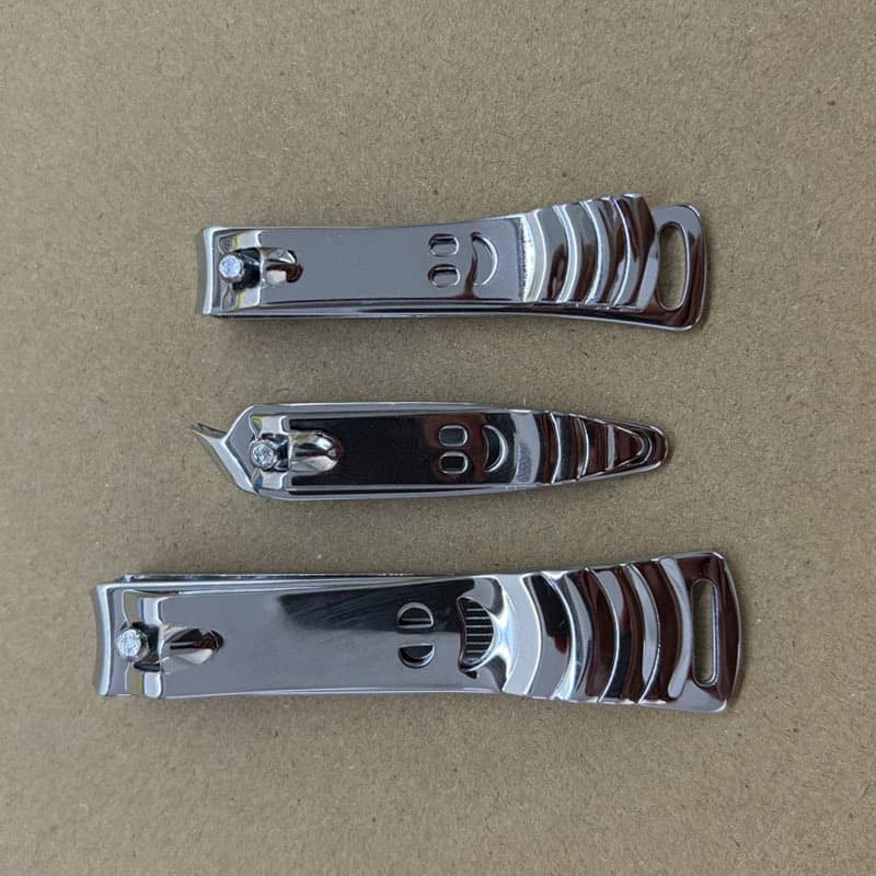Smiley face nail clippers, glossy nail scissors, manicure clippers, wholesale dollar store goods, Duoduo generation