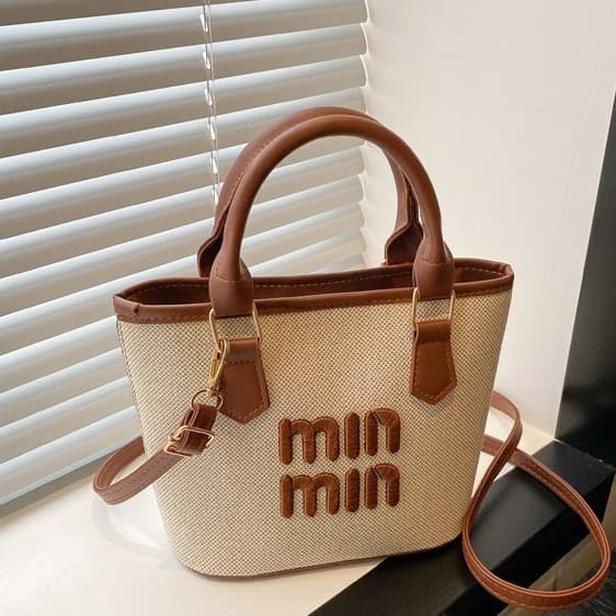 2026 New Letter Logo Canvas Bucket Women's Bag Korean Versatile Shoulder Crossbody Handbag Commuting Casual Women's Bag