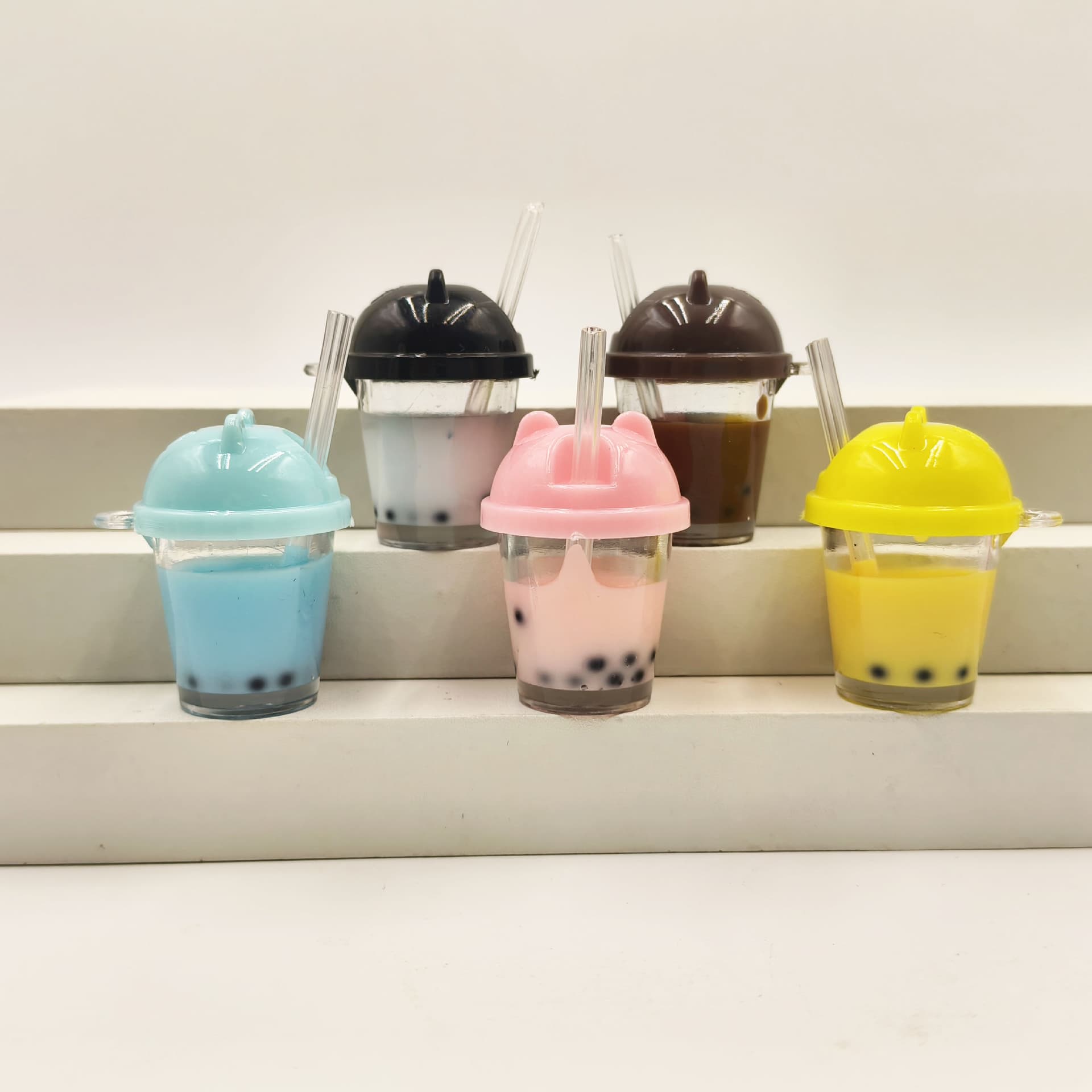 Creative cat head pearl milk tea cup keychain cute style DIY handmade accessories mobile phone bag pendant wholesale