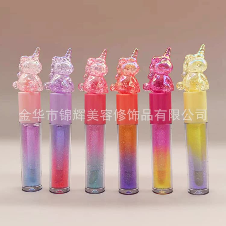 Gradient unicorn lip gloss for children, for export only.