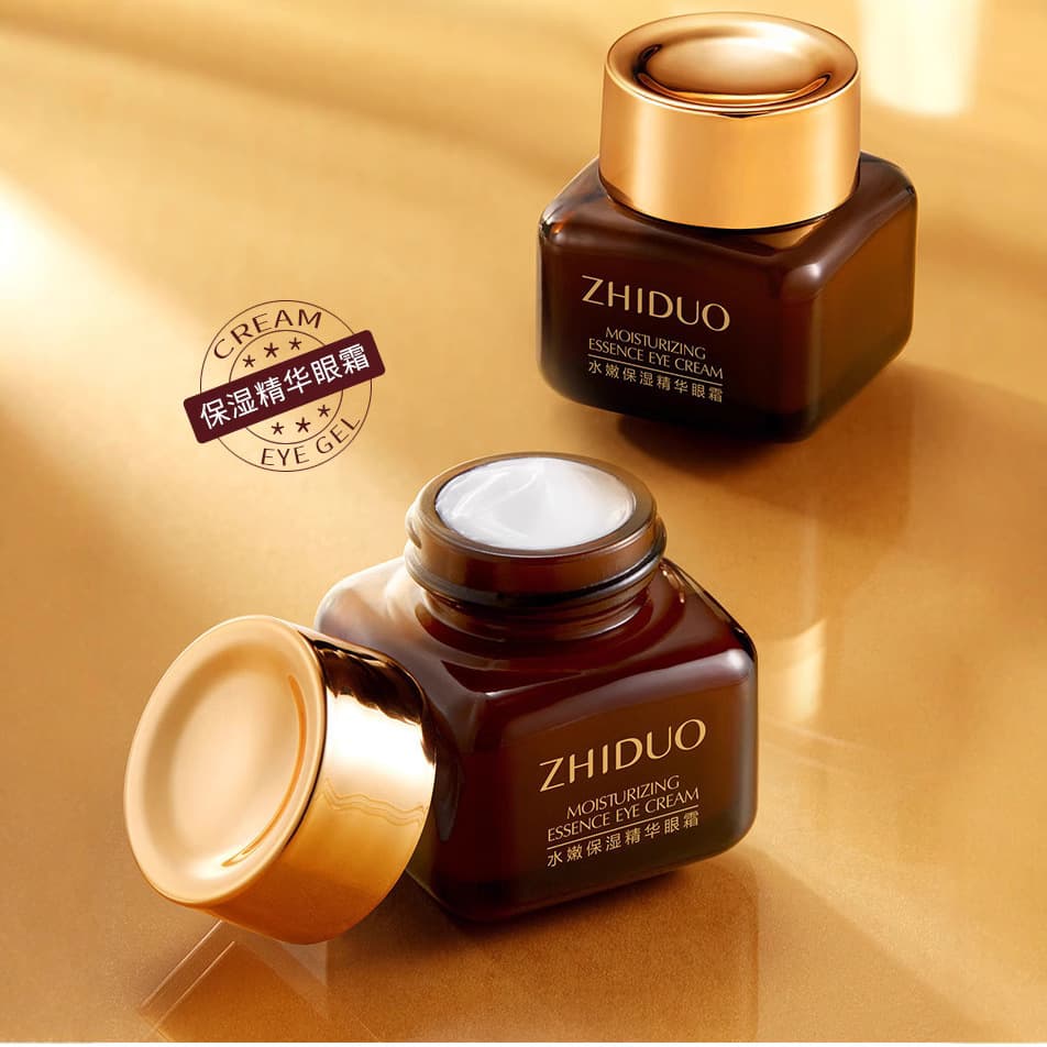 Zhiduo Hydrating Moisturizing Essence Eye Cream moisturizes and cares for the eye area, fades dark circles, small brown bottle eye cream, eye care