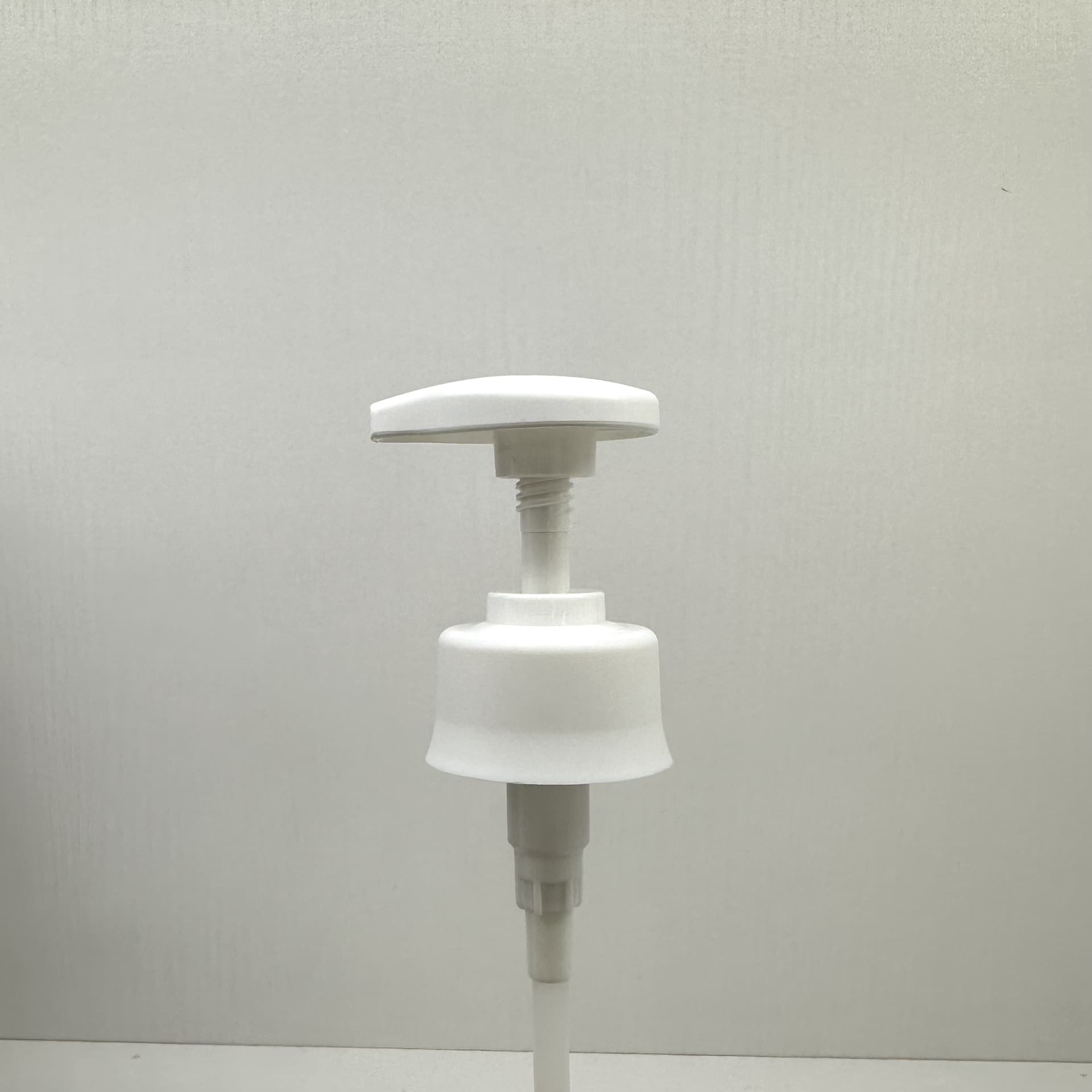 28/410 wholesale droplet-style spiral pump press heads, #28 plastic pump heads direct from manufacturer.