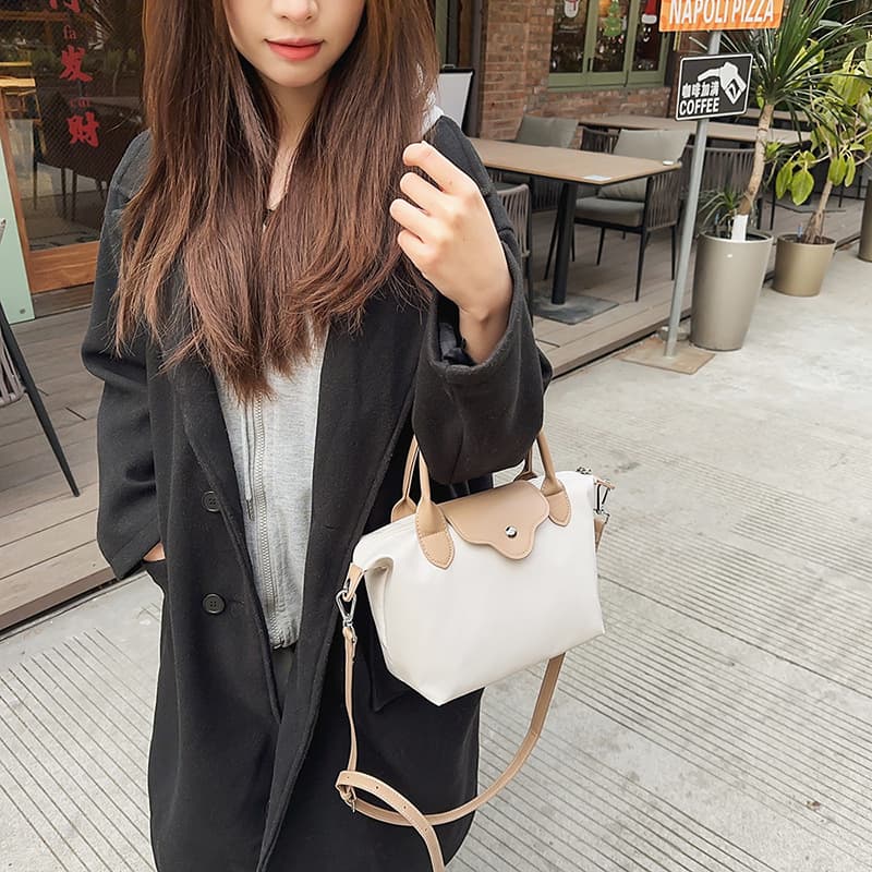 High-end commuter dumpling bag, lightweight waterproof, simple one-shoulder crossbody bag, casual and versatile large-capacity handbag