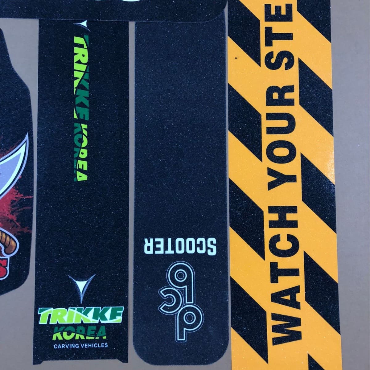 Skateboard colored anti-slip grip tape with colorful patterns, wear-resistant, waterproof, and anti-slip for stairs.